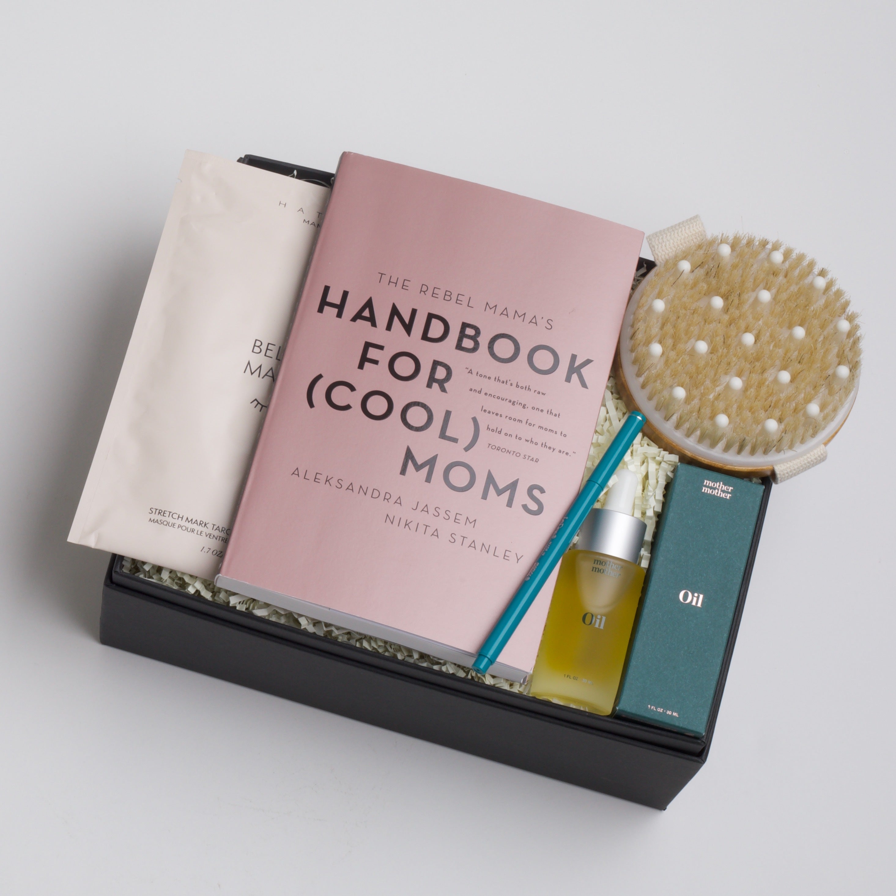 BOXFOX Gift Box filled with Handbook for (Cool) Moms, Le Pen Teal Pen, Mother Mother Belly Oil, HATCH Belly Sheet Mask, and Skön Round Dry Brush
