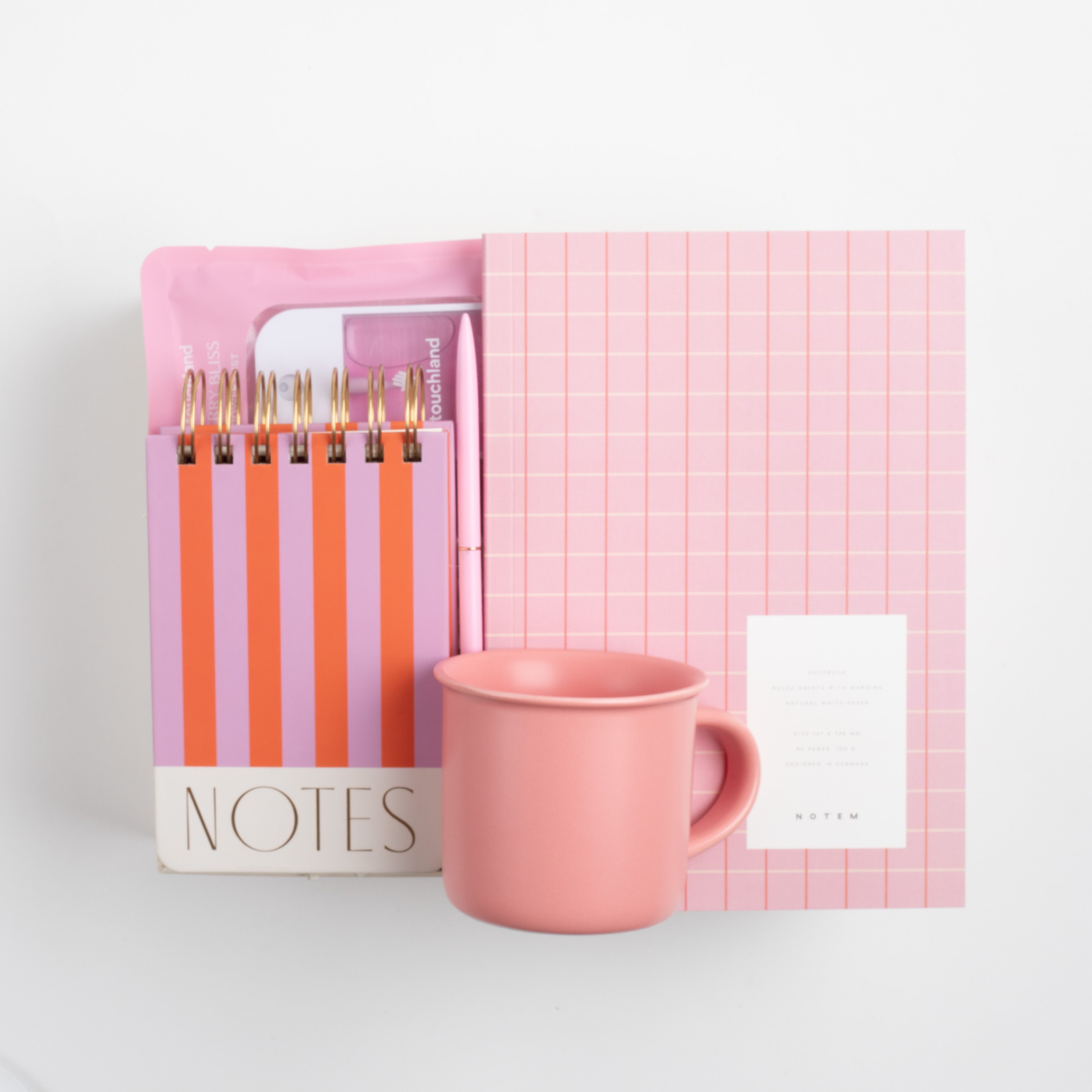 Notem Medium Vita Notebook - Rose, BOXFOX Camellia Pink Mug, BOXFOX Pink Bullet Pen, Designworks Pink & Orange Striped Notepad, and Touchland Berry Bliss Power Mist