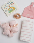 BOXFOX New Baby Girl Box including a swaddle, bunny soother, teether, hat, and book.