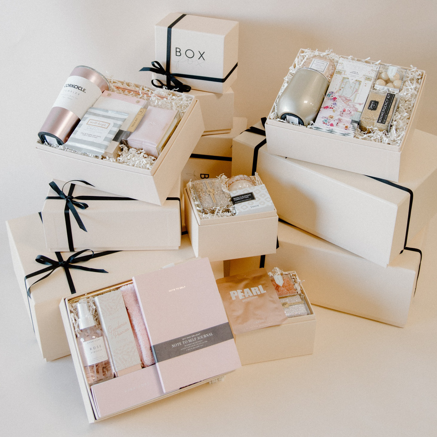 stack of creme boxes some open and some closed